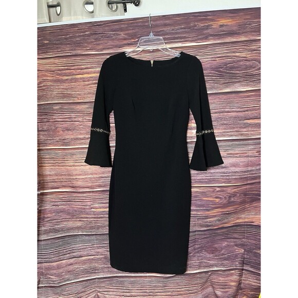 Calvin Klein Black Dress Size 2 Fitted with 3/4 Bell Sleeve With gold Rings. - Picture 1 of 8